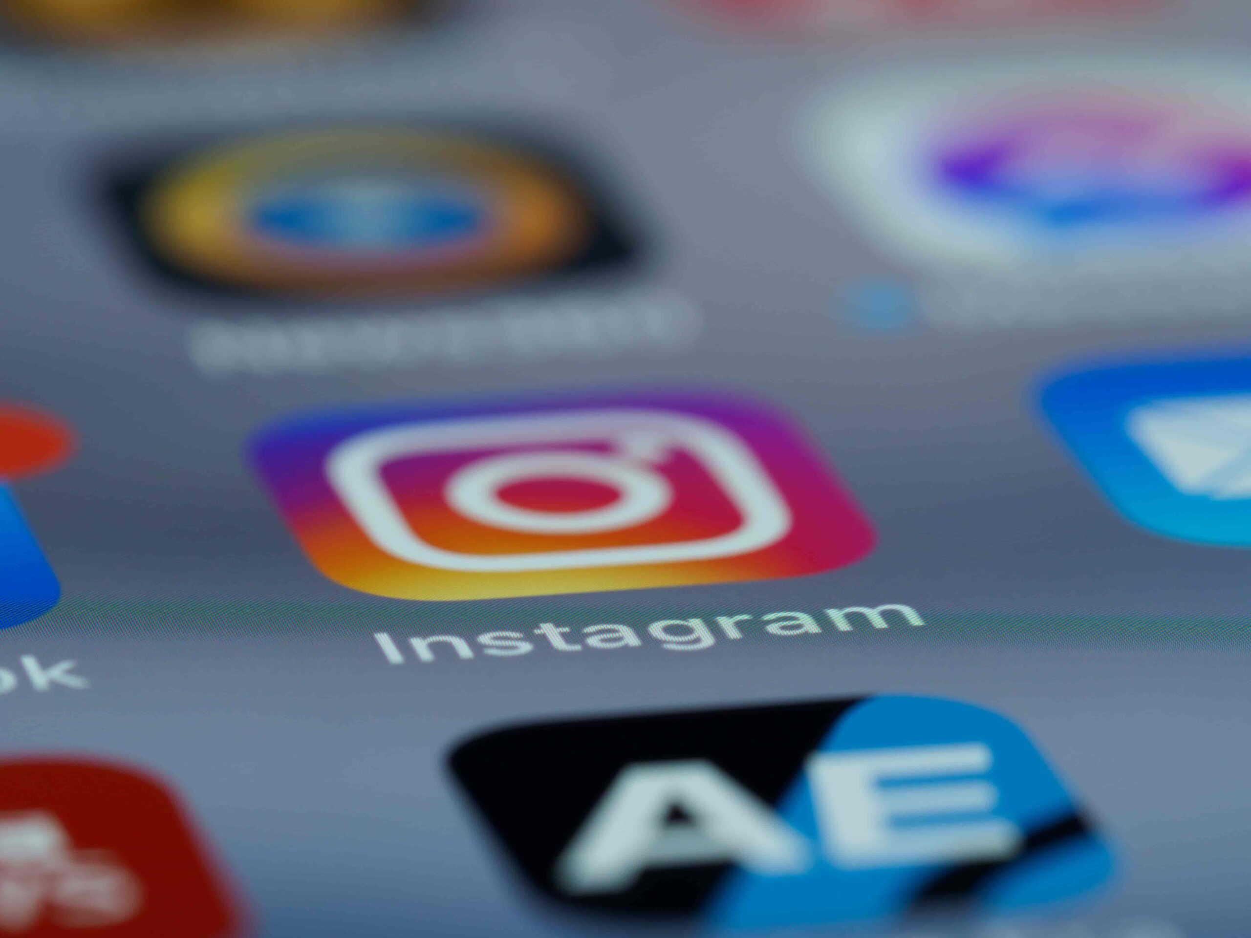 Instagram app icon on a smartphone screen among other apps